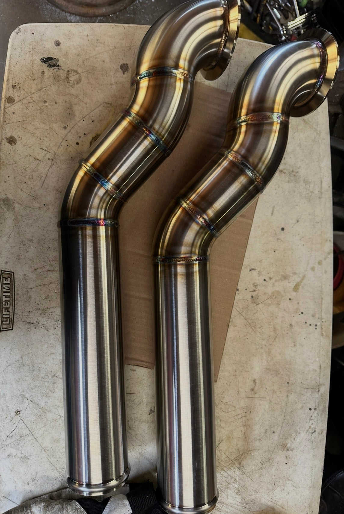 03-09 High mount charge pipe